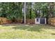 Backyard featuring a shed and a wooden fence at 3649 Guess Rd, Durham, NC 27705