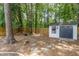 Backyard featuring a shed and a wooden fence at 3649 Guess Rd, Durham, NC 27705