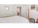 Inviting bedroom features hardwood flooring, a four poster bed and ample natural light at 3649 Guess Rd, Durham, NC 27705