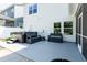 Backyard patio featuring a hot tub, plenty of seating, and a screened-in porch at 365 Jorpaul Dr, Wake Forest, NC 27587