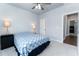 Relaxing bedroom with plush carpet, and a side door, offering peaceful retreat at 365 Jorpaul Dr, Wake Forest, NC 27587