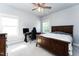 Well-lit bedroom with carpet, ceiling fan, study desk and chair creating a great space at 365 Jorpaul Dr, Wake Forest, NC 27587