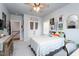Cozy bedroom with gray walls, plush carpet, and a double-door closet for ample storage at 365 Jorpaul Dr, Wake Forest, NC 27587