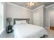 Peaceful bedroom features a ceiling fan, neutral walls, and comfortable furnishings at 365 Jorpaul Dr, Wake Forest, NC 27587