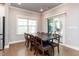 Spacious dining area with hardwood floors and sliding glass door to porch at 365 Jorpaul Dr, Wake Forest, NC 27587
