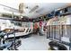 Well-organized garage featuring overhead storage and epoxy flooring, perfect for storage and hobbies at 365 Jorpaul Dr, Wake Forest, NC 27587