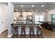 Bright kitchen boasts a breakfast bar with seating and stainless steel appliances at 365 Jorpaul Dr, Wake Forest, NC 27587