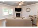Comfortable living room with fireplace, ceiling fan, and neutral decor at 365 Jorpaul Dr, Wake Forest, NC 27587