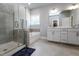 This is a luxurious main bathroom with a shower and soaking tub at 365 Jorpaul Dr, Wake Forest, NC 27587