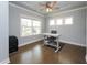 Well-lit office space featuring hardwood floors and large windows for natural light at 365 Jorpaul Dr, Wake Forest, NC 27587