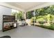 Cozy screened porch with grilling station, perfect for outdoor entertaining at 365 Jorpaul Dr, Wake Forest, NC 27587