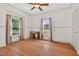 Bright and spacious bedroom with hardwood floors, ample natural light, and a neutral color palette at 408 N Fourth/ 4Th St, Mebane, NC 27302