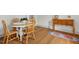 Dining area with wood floors, a dining table, and wooden hutch at 408 N Fourth/ 4Th St, Mebane, NC 27302