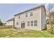 Expansive backyard with lush green lawn and patio seating perfect for outdoor relaxation at 418 Magna Dr, Durham, NC 27703