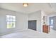 Neutral bedroom with a chalkboard wall and a view of the hallway at 418 Magna Dr, Durham, NC 27703