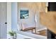 Entryway area with light-colored floors and walls, plus a bench with throw pillows at 418 Magna Dr, Durham, NC 27703