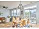 Bright living room with access to the backyard, hardwood floors, and modern decor at 418 Magna Dr, Durham, NC 27703