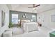 Spacious main bedroom with tray ceilings, lots of natural light, and neutral decor at 418 Magna Dr, Durham, NC 27703