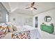 Bright main bedroom with tray ceilings, en-suite, and modern decor at 418 Magna Dr, Durham, NC 27703