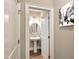 Charming powder room features a pedestal sink, round mirror, and neutral decor at 4416 Brighton Ridge Dr, Apex, NC 27539