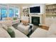 Cozy living room with a fireplace, built-in bookshelves, and comfortable seating for Gathering and guests at 4416 Brighton Ridge Dr, Apex, NC 27539