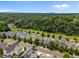 Beautiful aerial view of homes surrounded by mature trees and nature at 444 Claremont Dr, Chapel Hill, NC 27516