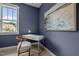 Cozy bedroom featuring a modern desk, stylish chair, and natural light at 444 Claremont Dr, Chapel Hill, NC 27516