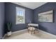 This bedroom boasts a sleek white desk and a picturesque window view at 444 Claremont Dr, Chapel Hill, NC 27516