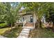 Inviting home with a covered front porch, well-manicured landscaping, and a classic design at 444 Claremont Dr, Chapel Hill, NC 27516