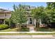 Charming home with a welcoming front porch, mature trees, and well-maintained lawn at 444 Claremont Dr, Chapel Hill, NC 27516