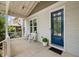 Charming front porch featuring rocking chairs, a stylish entrance, and a cozy atmosphere at 444 Claremont Dr, Chapel Hill, NC 27516
