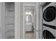 Hall view featuring washer and dryer and view of bathroom and linen closet at 444 Claremont Dr, Chapel Hill, NC 27516