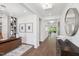 Hallway view showing office space and exterior view beyond to a patio with outdoor seating at 45 Shady Creek Way, Fuquay Varina, NC 27526