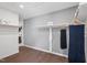 Spacious walk-in closet featuring hardwood floors, a shelf, and hanging rods for ample storage and organization at 45 Shady Creek Way, Fuquay Varina, NC 27526