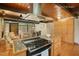 Gourmet kitchen with granite counters, stainless steel appliances, and a central island at 4501 Zebulon Rd, Zebulon, NC 27597