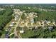 High aerial view of a well-established residential community with lush trees and landscaped yards at 456 Majestic Oak Dr, Garner, NC 27529
