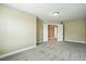 This spacious carpeted bedroom features double doors and neutral paint at 456 Majestic Oak Dr, Garner, NC 27529