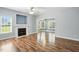 Comfortable living room with fireplace and an open floor plan at 456 Majestic Oak Dr, Garner, NC 27529