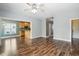 Spacious living room showcasing a view to an open kitchen and entry to the outside at 456 Majestic Oak Dr, Garner, NC 27529