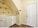 Functional mud room featuring built-in cabinets, countertop space, and convenient storage at 456 Majestic Oak Dr, Garner, NC 27529