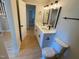 Bathroom with dual sink vanity, modern fixtures, and neutral paint that creates a soothing space at 510 May St, Gibsonville, NC 27249