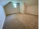 Bedroom with carpet, neutral walls and ceiling, window, and a closet door at 510 May St, Gibsonville, NC 27249