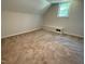 Bedroom with carpet, light walls and ceiling, window, and built-in shelving at 510 May St, Gibsonville, NC 27249
