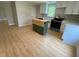 Updated kitchen featuring new stainless steel appliances, countertops, and an island, perfect for cooking and entertaining guests at 510 May St, Gibsonville, NC 27249