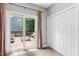 Dining area with pink curtains and sliding glass doors leading to an outdoor deck at 5301 Denmead Way, Raleigh, NC 27613