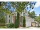 Charming two-story home with a brick facade and well-manicured landscaping at 5301 Denmead Way, Raleigh, NC 27613