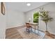 Bright bedroom featuring desk area and a large window with a pleasant view at 5721 Meadow, Knightdale, NC 27545
