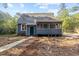 Charming single-story home with a cozy sunroom and serene surroundings at 5721 Meadow, Knightdale, NC 27545
