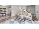 Bright living room features stylish furniture, and plenty of natural light at 5721 Meadow, Knightdale, NC 27545