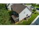 Aerial view of home featuring pristine landscaping, screened in porch, and back deck at 5818 Myakka Ct, Raleigh, NC 27616